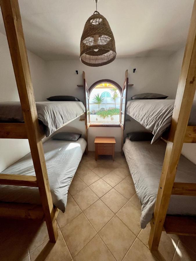 Хостел Pura Vida Surf Camp & School Ла-Олива Экстерьер фото